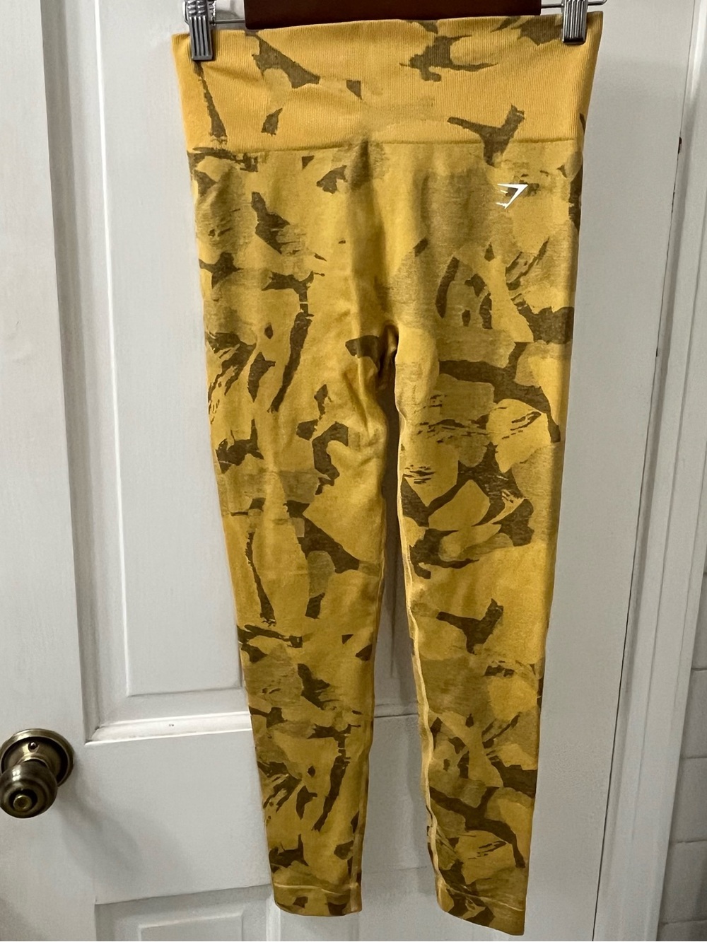 Gymshark Women’s  Adapt Camo Seamless Leggings in the colorway Savanna Yellow.